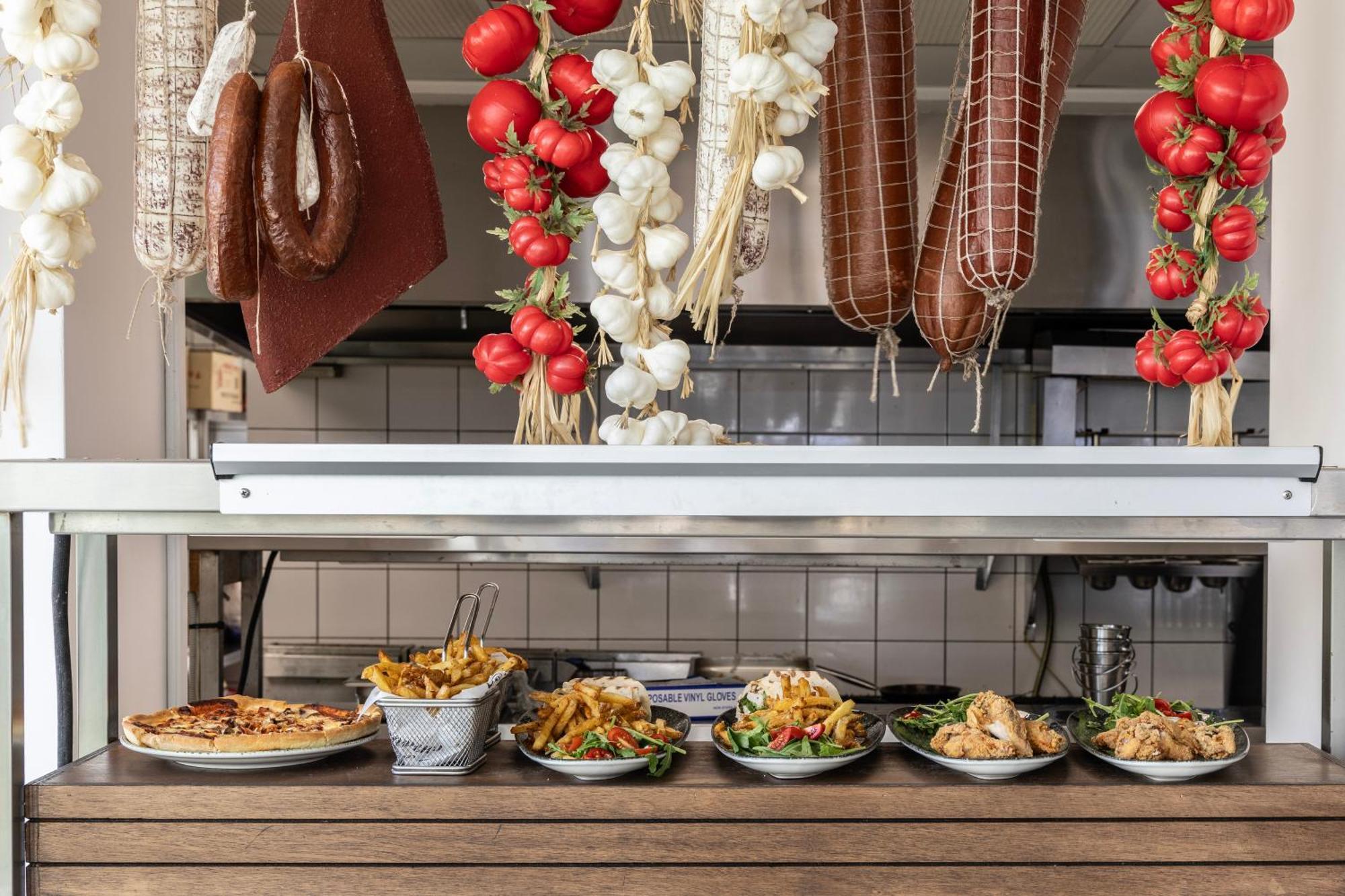 Ivi Mare - Designed For Adults By Louis Hotels Geroskipou Dış mekan fotoğraf A display of prepared tapas at a restaurant in Madrid